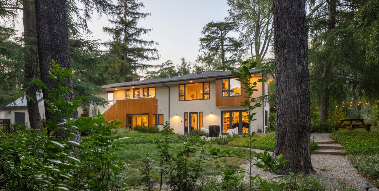 The House in the Forest landscape design by EPTDESIGN — modern home nestled among mature pine trees with native woodland garden and gravel path